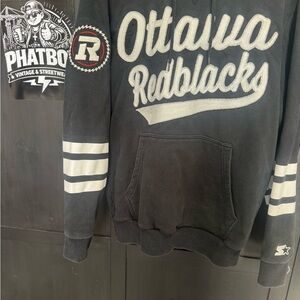 STARTER Black and White Ottawa Redblacks Varsity hoodie